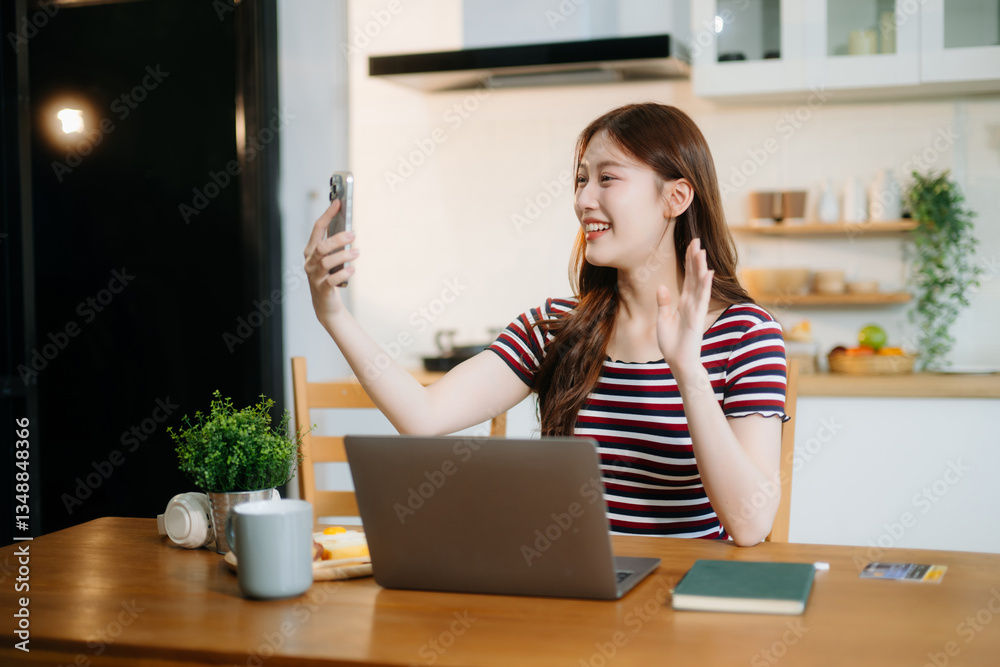 oung Asian woman with sitting working on laptops and tablets in a cozy workspace. Perfect for education, innovation, oung Asian woman with sitting working on laptops and tablets in a cozy workspace. Perfect for education, innovation,