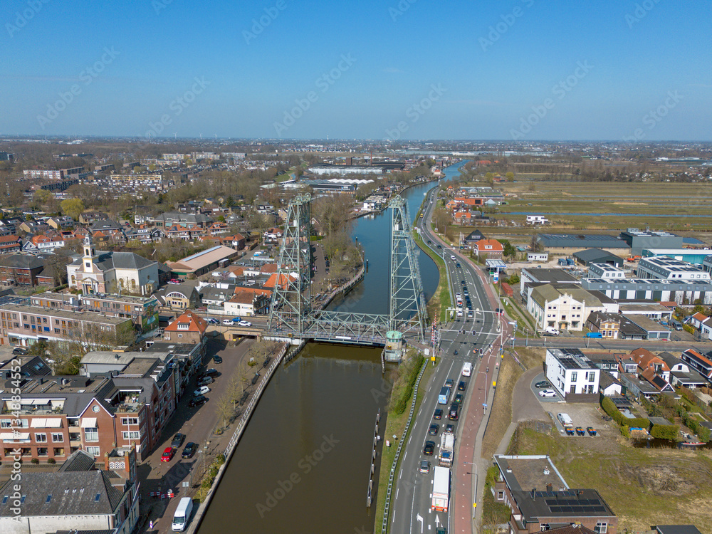 Fototapeta premium Steel vertical lift bridge over the Gouwe canal in Waddinxveen