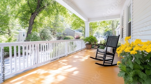 Sunny porch with rocking chair and vibrant yellow flowers