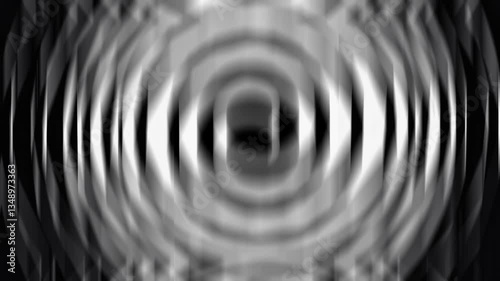 Abstract spiral pattern on a black background, creating a dynamic visual effect.
