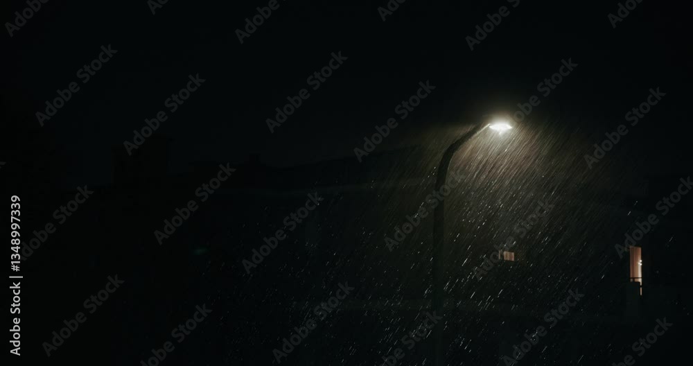 Street Light In Heavy Rain And Strong Wind At Night. Thunderstorm With Thunder Lightning. static shot