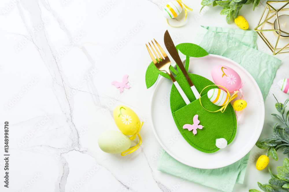 Easter table decor at white background.