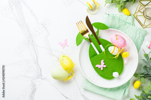 Easter table decor at white background.