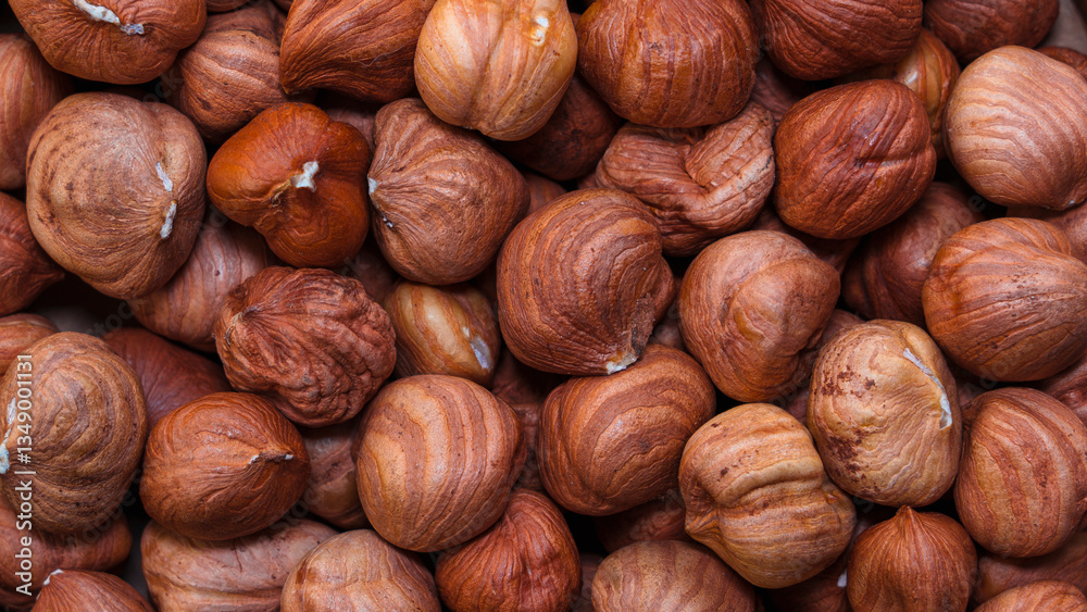 Close-up of whole hazelnuts in shell as a natural background Close-up of whole hazelnuts in shell as a natural background