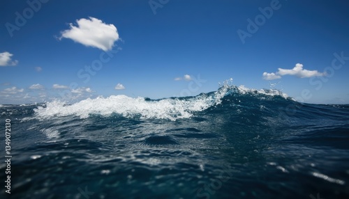 Wallpaper Mural Dynamic ocean waves surging under clear blue skies nature photography coastal environment close-up perspective Torontodigital.ca