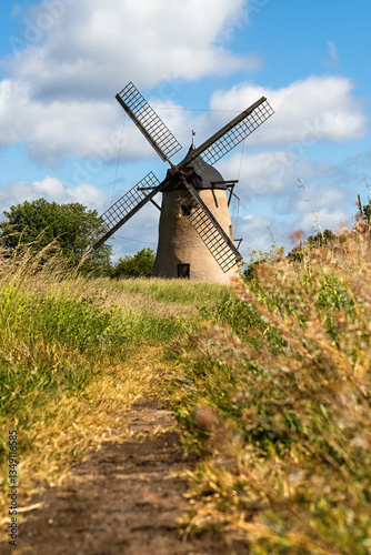 Visby windmill traditional Gotland island Sweden clouds blue sky summer sun Baltic sea coast