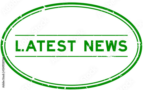 Grunge green latest news word oval rubber seal stamp on white background