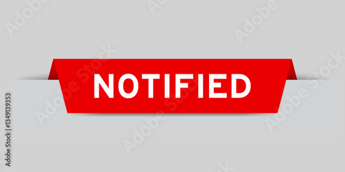 Red color inserted label with word notified on gray background