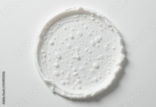 Overhead View of White Powder Texture with Bubbles on White Surface