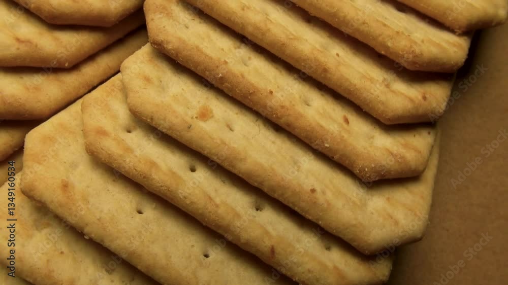 fresh cracker cookies laid out on food paper close up fresh cracker cookies laid out on food paper close up