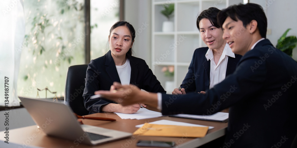 Legal Consultation and Digital Strategy. Lawyers using technology for a client meeting. Legal Consultation and Digital Strategy. Lawyers using technology for a client meeting.
