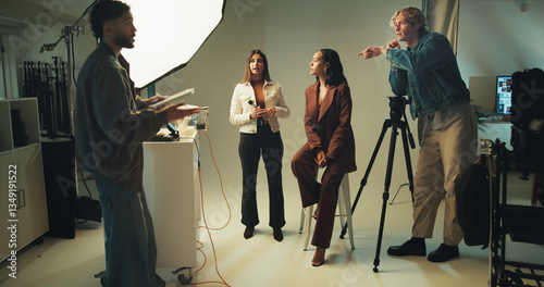 Makeup artist, model and photographer together in studio for discussion, photoshoot or planning. Backstage, creative and media with photography people on set for collaboration, conversation or review