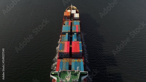 Wallpaper Mural A Cinematic Shot Of The Stern Of A Cargo Container Ship As It Approaches Halifax Bay, Nova Scotia. The Scene Reflects The Vital Role Of Sea Freight In International Shipping And Trade Logistics. Torontodigital.ca