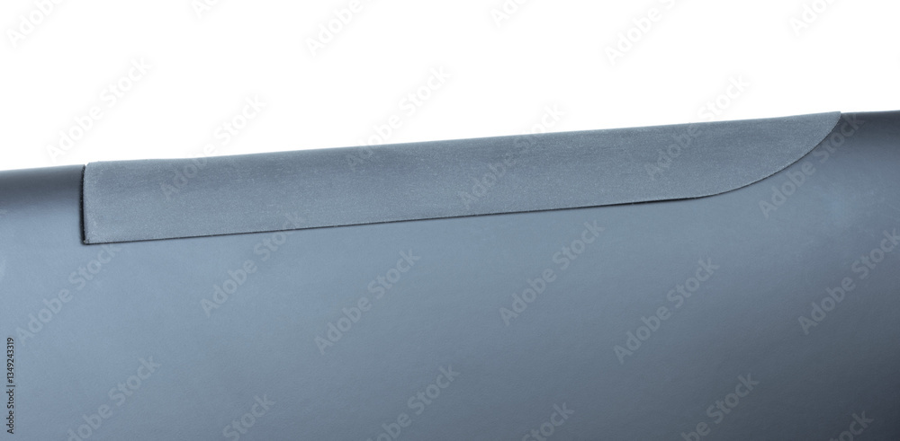 Cushioned rubber cheek rest on a polymer stocked shotgun isolated