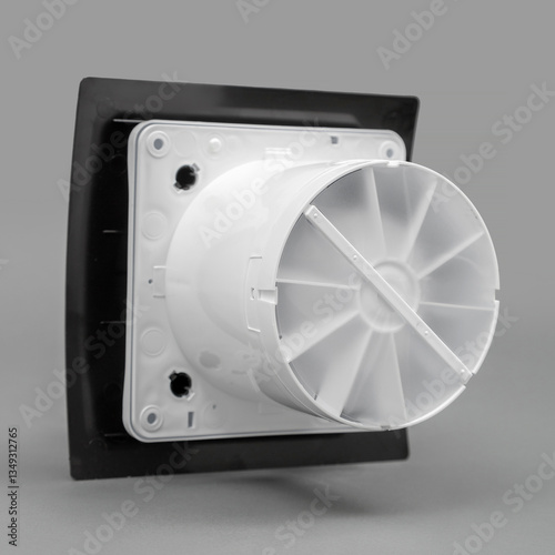 White fan on a gray background. Ventilation system.
