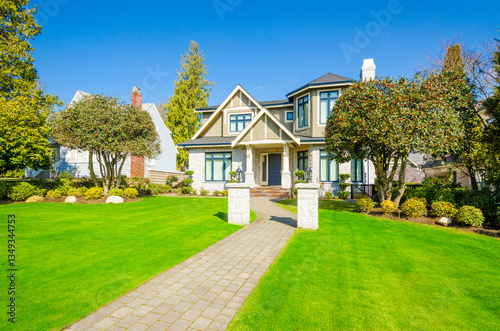 Wallpaper Mural Two story luxury house with beautiful summer  landscape in Vancouver, Canada, North America. Day time on June 2024 Torontodigital.ca