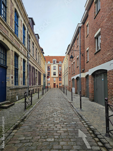 Vieux Lille Old town : Empty Narrow Cobblestone Street and Old Architectural Buildings in the Historic City Center, Northern France