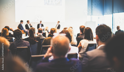 Interview and round table discussion at business convention and presentation. Audience at the conference hall. Business and entrepreneurship symposium.
