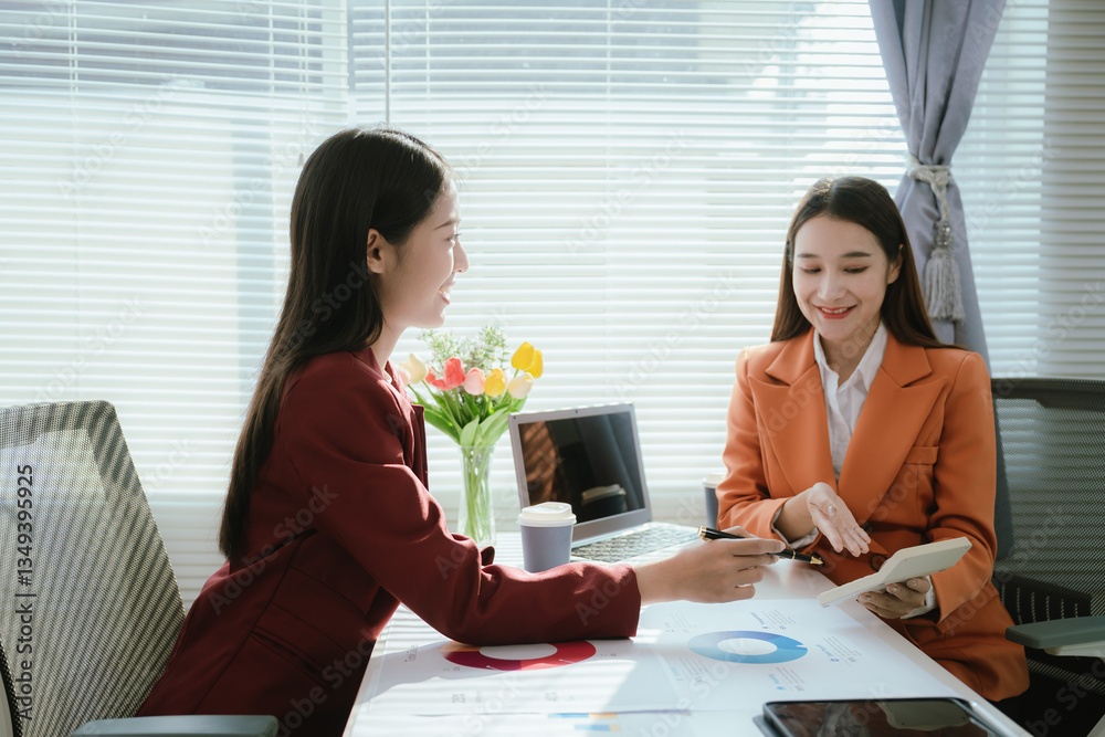 Businesswoman analyzes financial data in modern office, reviews charts and reports, plans investment strategies, and discusses growth opportunities with colleagues to drive organizational success. Businesswoman analyzes financial data in modern office, reviews charts and reports, plans investment strategies, and discusses growth opportunities with colleagues to drive organizational success.