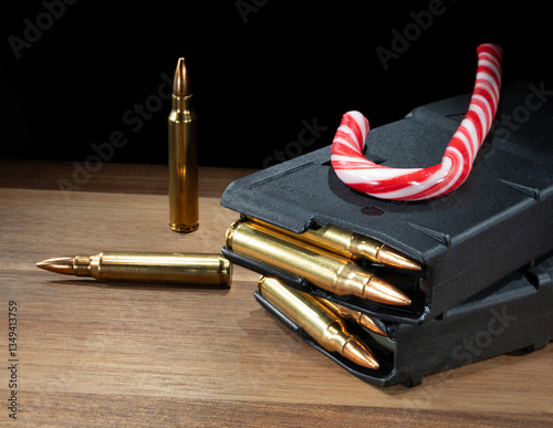 Obraz na płótnie Candy cane on top of assault rifle magazines w salonie