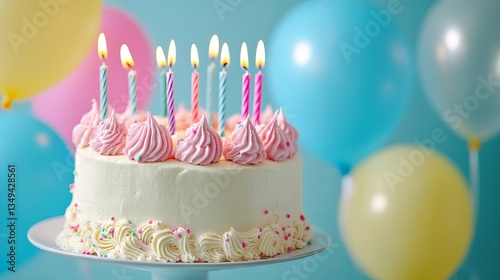 Birthday Cake with Candles and Balloons, Creating a Festive and Joyful Celebration Atmosphere photo