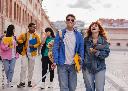 Obraz na płótnie Blind university student walking with friends on campus