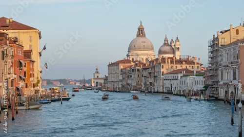 Hyper lapse of Grand Canal traffic and Basilica di Santa Maria della Salute, view from Accademia bridge, Venice, Italy