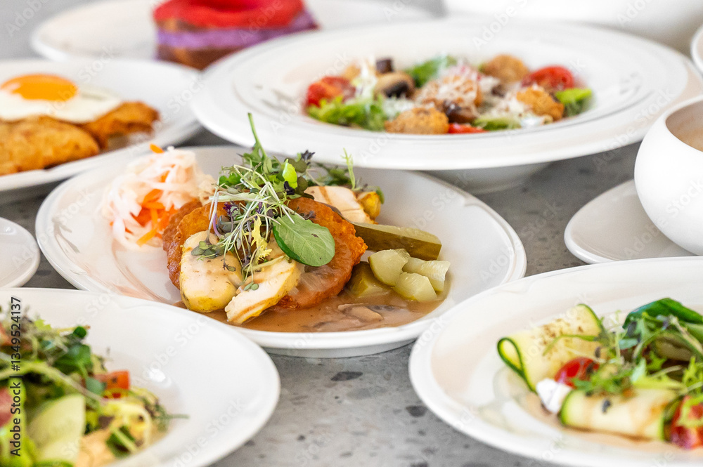 A selection of gourmet dishes, including a salad, pickles with greens, a fried egg, and other meals, displayed on plates, highlighting culinary variety and presentation A selection of gourmet dishes, including a salad, pickles with greens, a fried egg, and other meals, displayed on plates, highlighting culinary variety and presentation