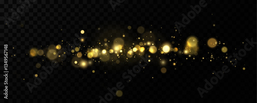 Christmas Bokeh Lights.bokeh is the soft, pleasing out of focus effect from a lens.Defocused gold particles glitter on a transparent background.	