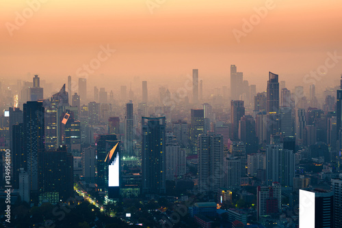 Crowded financial skyscraper in dust and smog during the morning at Bangkok