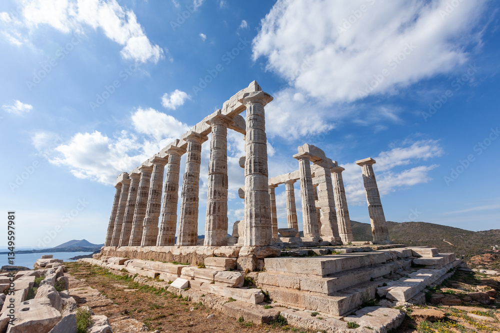 Temple of Poseidon at Sounio Cape, in south Attica region, Greece, Europe. The temple was built in 5th century BC and was dedicated to the god of sea.