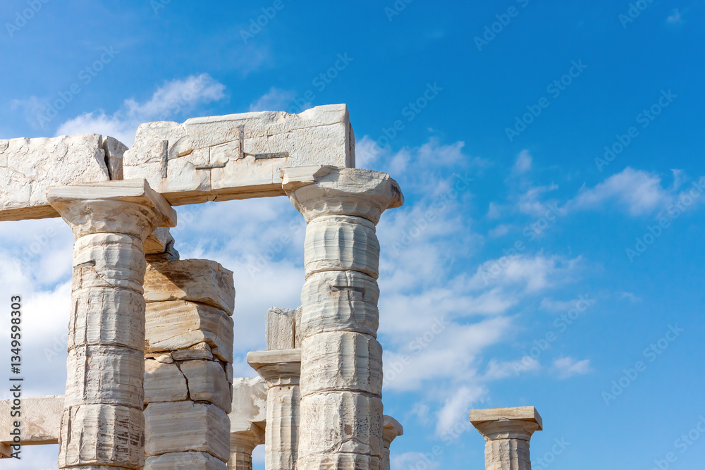 Detail of the ancient doric temple of Poseidon, in Sounion, Greece, Europe. The temple was built in the 5th century BC by the Athenians, dedicated to Poseidon the god of the sea.