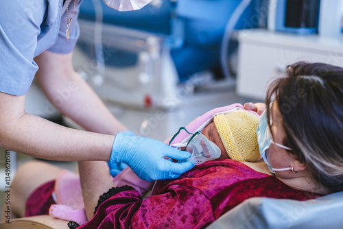Nurse Providing Oxygen to a Premature Baby