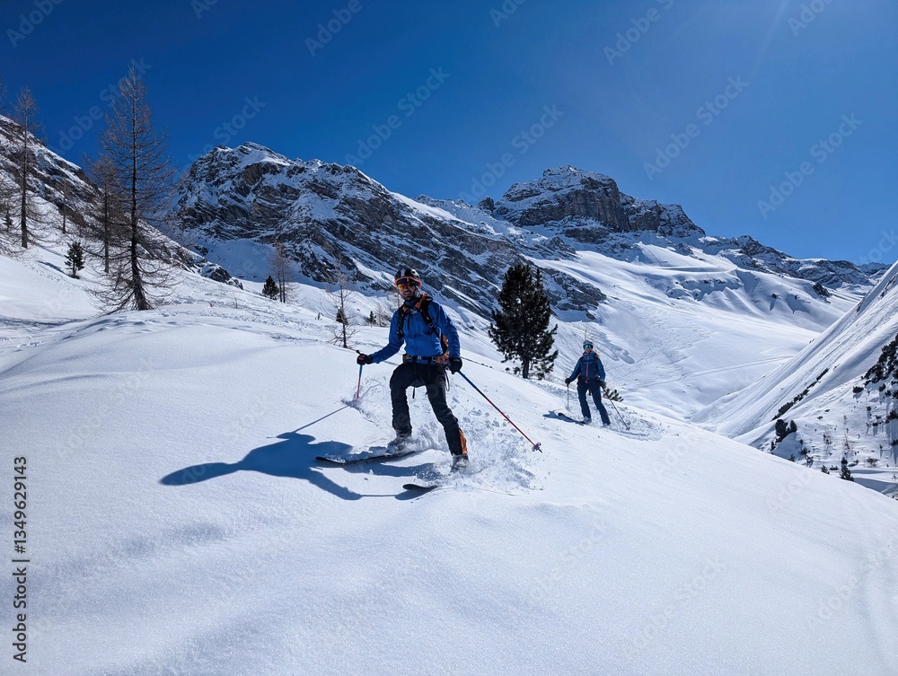 Ski tour through the Ducan Valley to the Hoch Ducan above Sertig Davos. The Plattaflue mountain is in the background. Ski mountaineering in the Davos Klosters Mountains. High quality photo Ski tour through the Ducan Valley to the Hoch Ducan above Sertig Davos. The Plattaflue mountain is in the background. Ski mountaineering in the Davos Klosters Mountains. High quality photo