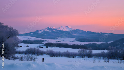 Serene Winter Sunrise Snow-Covered Landscape with Majestic Mountain Peak