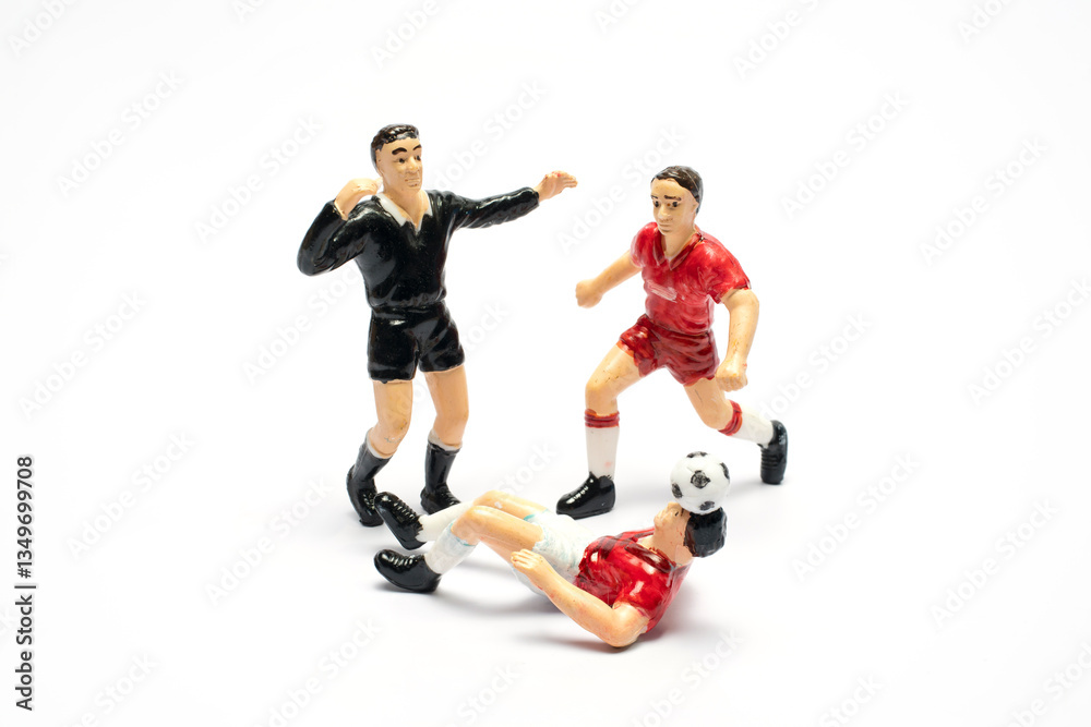 Obraz premium Football player toy, playing football