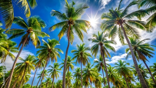 Wallpaper Mural Tropical Palm Trees Under a Clear Blue Sky. Green Palm Trees Against Bright Blue Sky. Summer Vibes. Torontodigital.ca