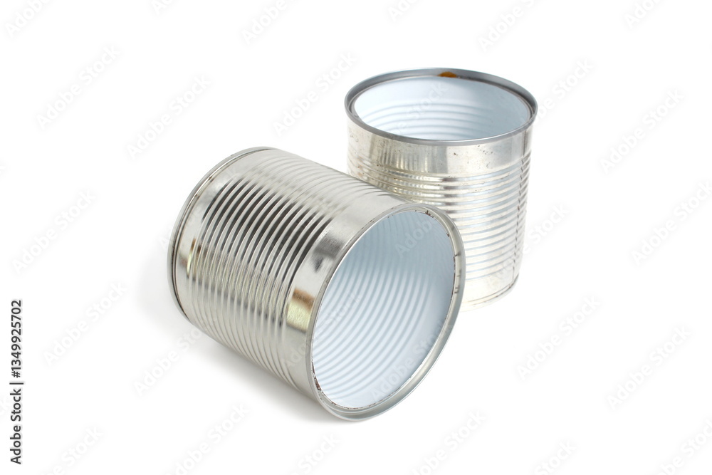 On a white background there are two empty containers from canned food. On a white background there are two empty containers from canned food.