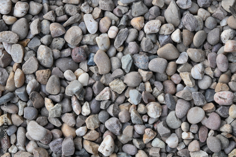 A pile of rocks with a grayish color A pile of rocks with a grayish color