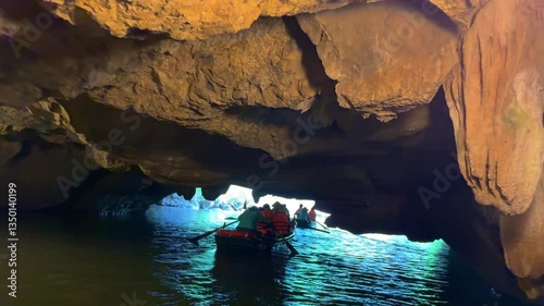 Trang An River Ninh Minh and Bai Dinh Mountain ranges in Vietnam only 3 hours drive from Hanoi. Beautiful winding river and large rising mountains. boats going through the caves in the river