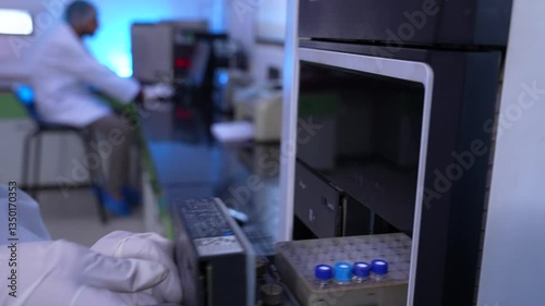 Wallpaper Mural HPLC science experiment Vials filling inside an autosampler of an HPLC machine inside view in a Scientific experimental laboratory for research development analysis and ipqa test study	 Torontodigital.ca