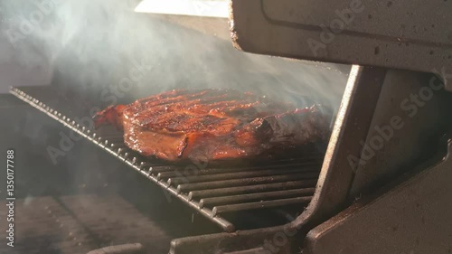 Chef Moving Delicious British Sirloin Steak Out of BBQ Flames Revealing Grilled Meat with Dripping Olive Oil Showing Juicy Tender Superior Quality 4K