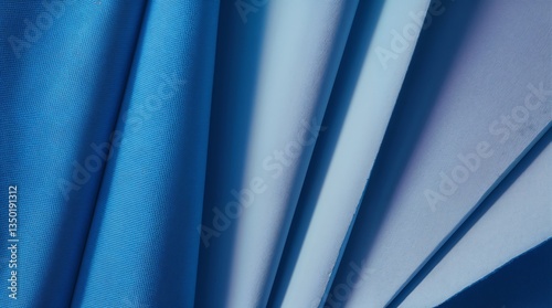 wavy abstract background made of blue fabric