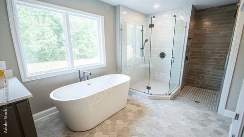 Modern, bright bathroom with soaking tub and walk-in shower