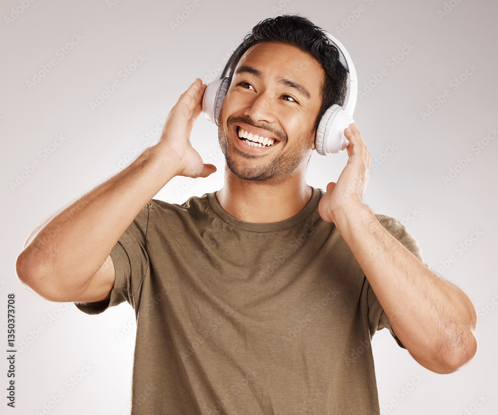 Φωτογραφία Studio, man and laughing with headphones for music, podcast and satisfied with playlist for motivation
