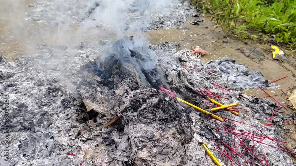 Burning Incense and Ashes in an Outdoor Ritual Scene with billowing smoke Burning Incense and Ashes in an Outdoor Ritual Scene with billowing smoke