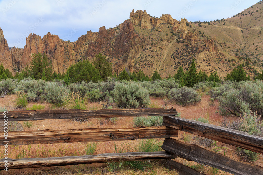 North America, United States, Oregon, Central Oregon, Redmond, Terrebonne, Oregon. Smith Rock State Park. Crooked River. High Desert. Basalt rocks and cliffs. Split-rail fencing.