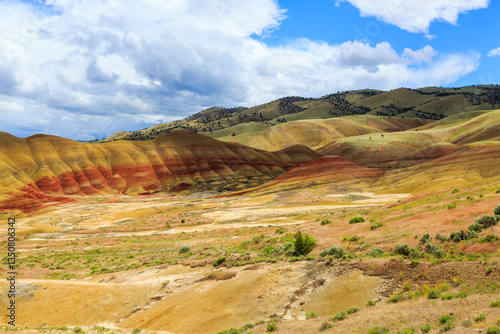 Obraz na płótnie North America, United States, Oregon, Central Oregon, Redmond, Bend, Mitchell. Series of low clay hills striped in colorful bands of minerals, ash and clay deposits. w salonie