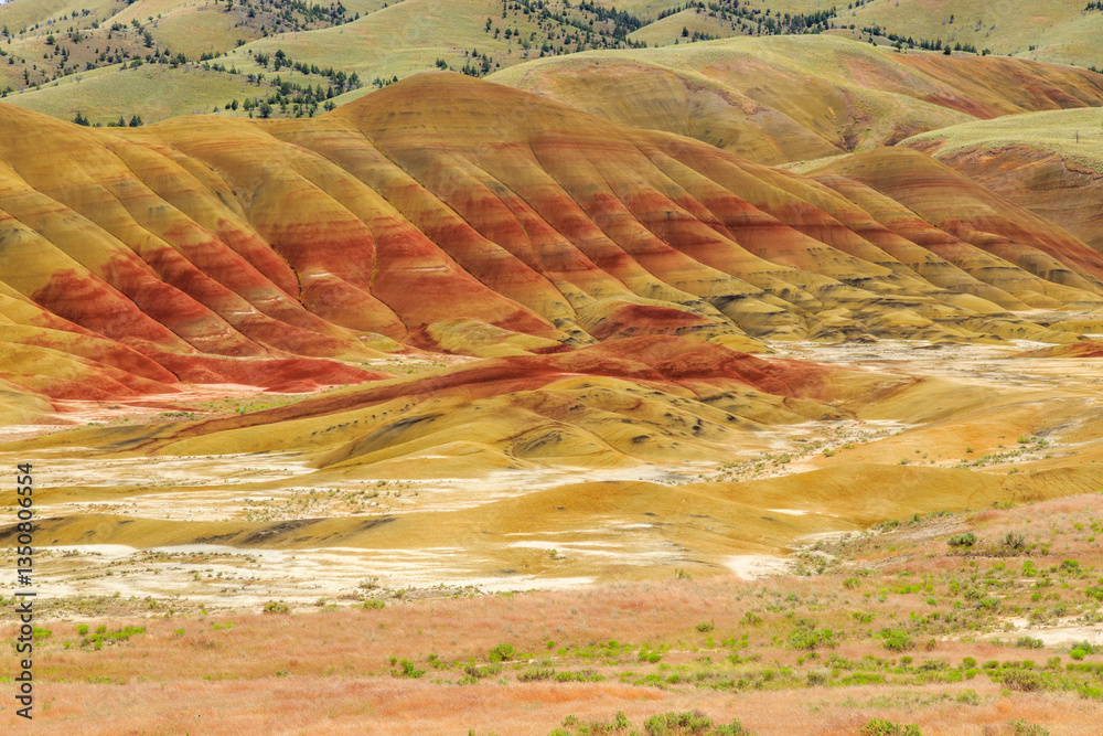 North America, United States, Oregon, Central Oregon, Redmond, Bend, Mitchell. Series of low clay hills striped in colorful bands of minerals, ash and clay deposits.