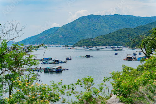 Fishing village on the water.
South China Sea, Vietnam. Floating fishing villages.